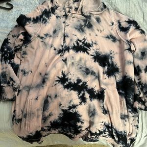 Torrid pink and black tie dye hooded sweatshirt with a front kangaroo pocket